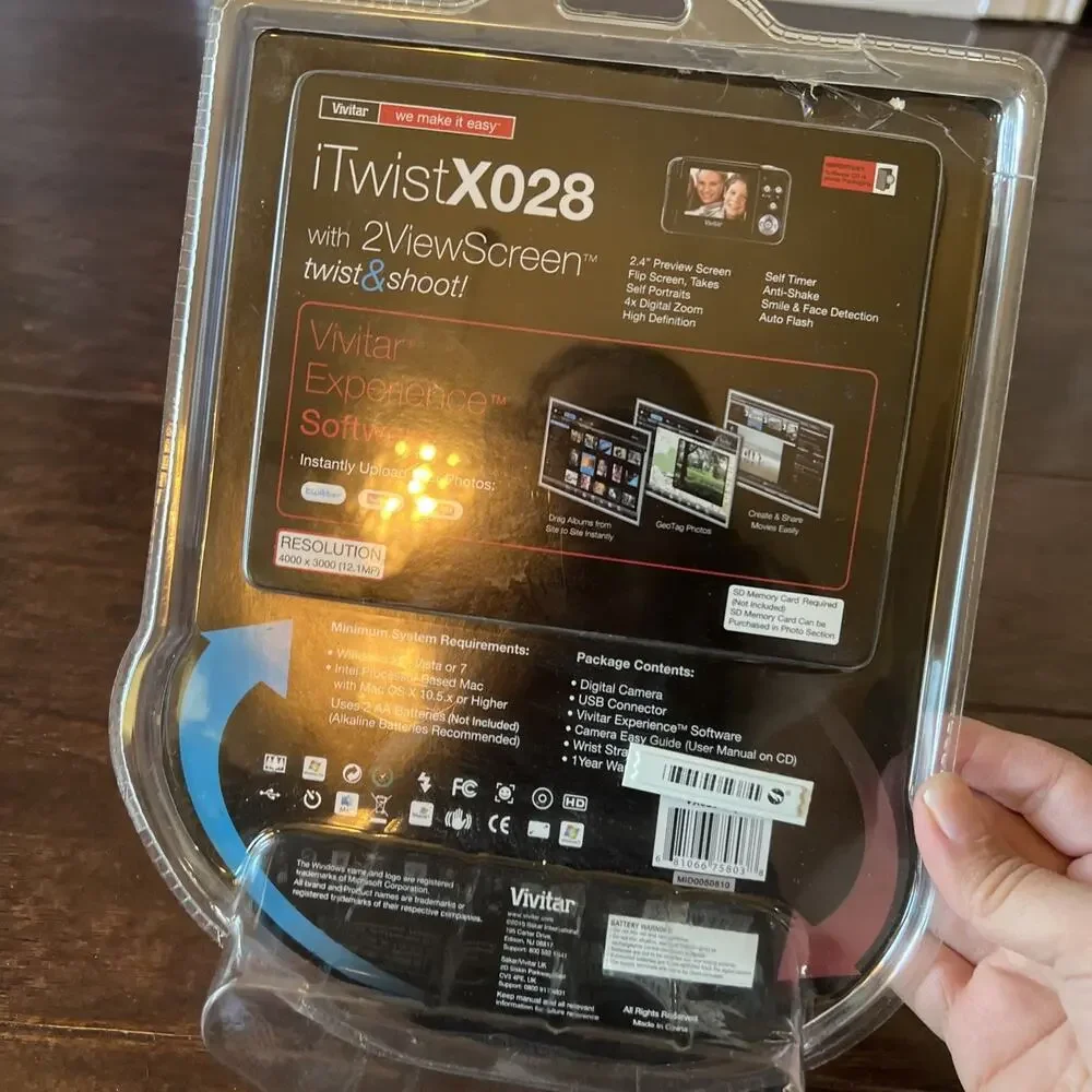 Vivitar ViviCam Twist X028 digital camera 12.1 Mega Pixels 4x Zoom NEW OPEN BOX